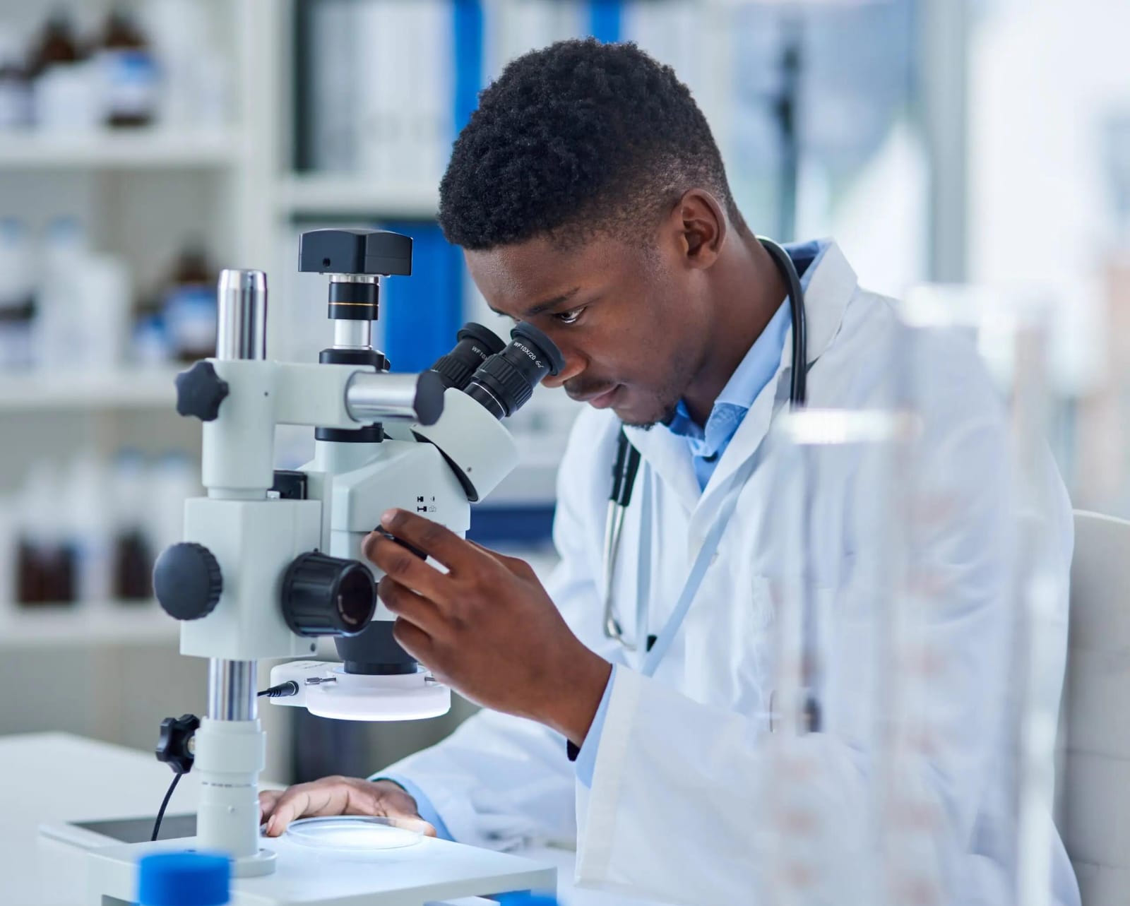 Medical professional using diagnostic equipment